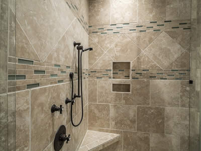 custom tile shower and oil rubbed bronze plumbing fixtures